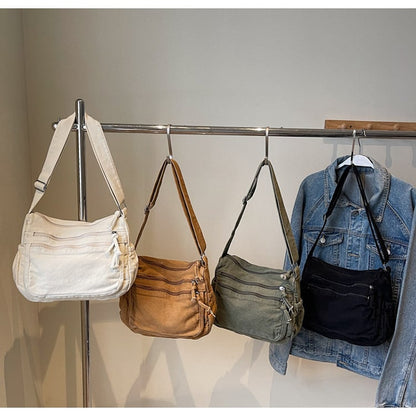👜✨ Distressed Canvas Messenger Bag – Multi-Zipper Layered Design, Wide Adjustable Strap