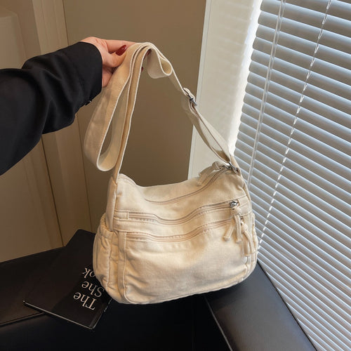 👜✨ Distressed Canvas Messenger Bag – Multi-Zipper Layered Design, Wide Adjustable Strap